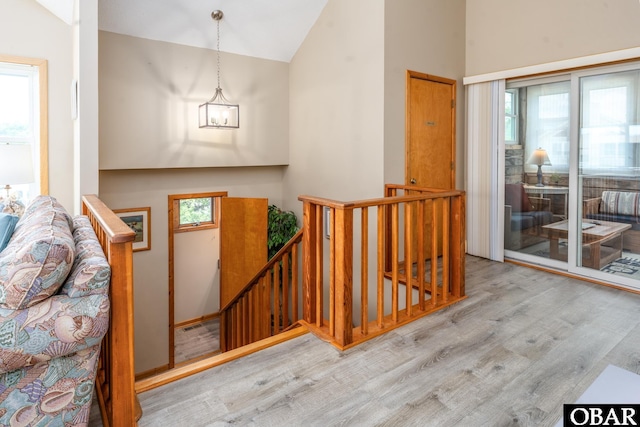 1133 Payson St Lot 120, Corolla, NC 27927 - staircase with wood finished floors and high vaulted ceiling