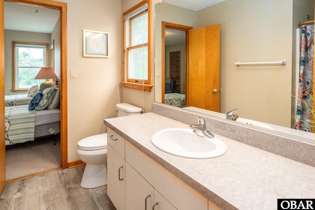 1133 Payson St Lot 120, Corolla, NC 27927 - ensuite bathroom featuring wood finished floors, vanity, and a shower with curtain