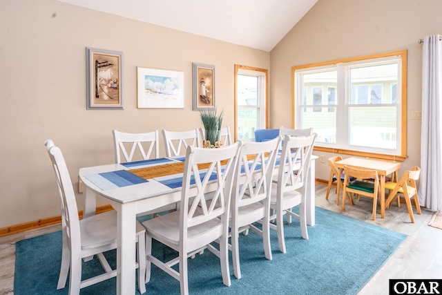 1133 Payson St Lot 120, Corolla, NC 27927 - dining space featuring vaulted ceiling and wood finished floors