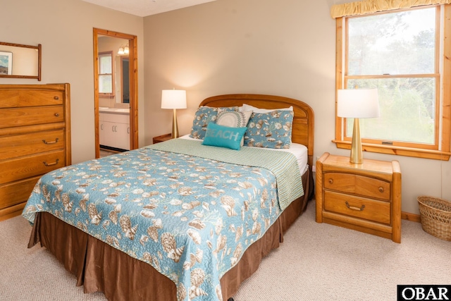 1133 Payson St Lot 120, Corolla, NC 27927 - carpeted bedroom featuring connected bathroom