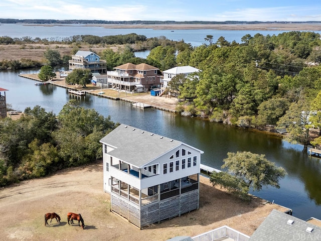 aerial view featuring a water view