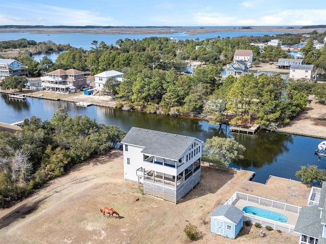 bird's eye view with a water view