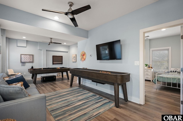 living room featuring baseboards, billiards, wood finished floors, and a ceiling fan