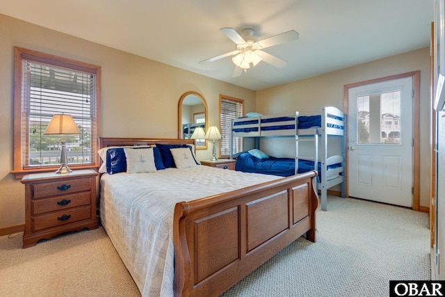 117 Four Seasons Ln Lot 12, Duck, NC 27949 - bedroom featuring light carpet, multiple windows, and ceiling fan