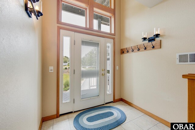 117 Four Seasons Ln Lot 12, Duck, NC 27949 - entrance foyer featuring light tile patterned floors and baseboards
