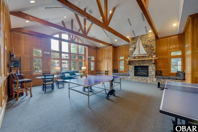 117 Four Seasons Ln Lot 12, Duck, NC 27949 - playroom with high vaulted ceiling, a decorative wall, beam ceiling, carpet flooring, and a stone fireplace