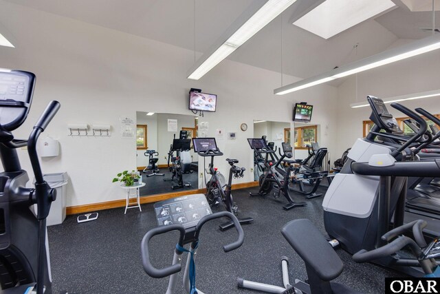 117 Four Seasons Ln Lot 12, Duck, NC 27949 - exercise room featuring a skylight and high vaulted ceiling