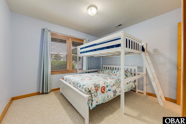 117 Four Seasons Ln Lot 12, Duck, NC 27949 - carpeted bedroom featuring baseboards