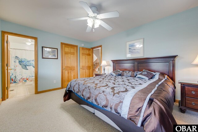 117 Four Seasons Ln Lot 12, Duck, NC 27949 - bedroom with carpet, ceiling fan, and ensuite bath