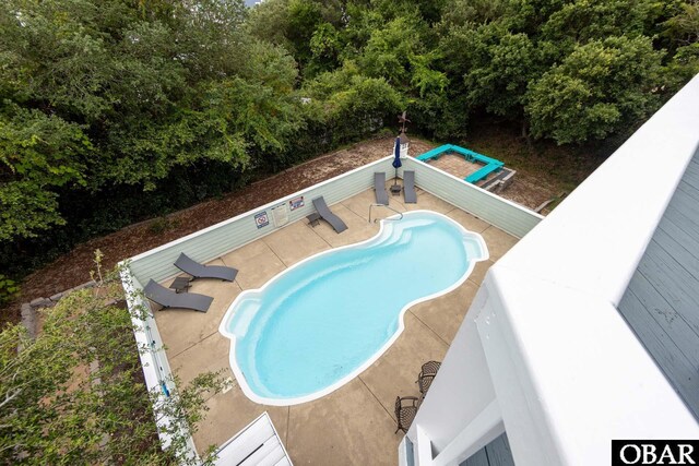 117 Four Seasons Ln Lot 12, Duck, NC 27949 - view of swimming pool featuring a patio
