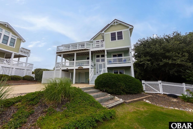 117 Four Seasons Ln Lot 12, Duck, NC 27949 - beach home featuring stairway, a deck, and a gate