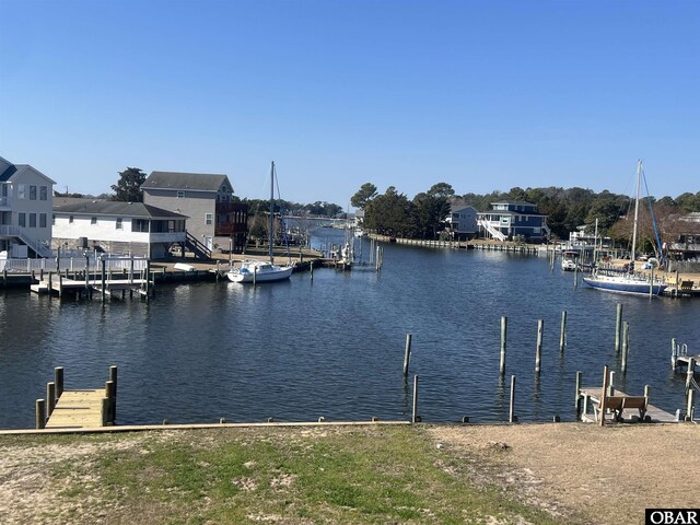 dock area featuring a water view