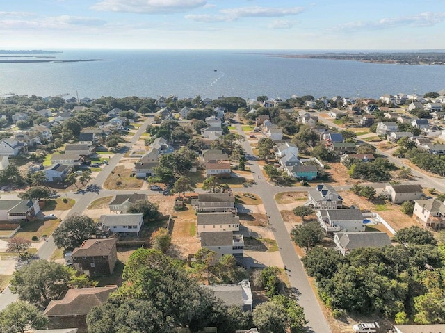 aerial view with a residential view and a water view