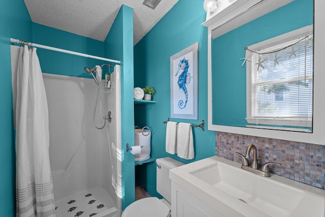 bathroom featuring a textured ceiling, toilet, vanity, a shower stall, and tasteful backsplash