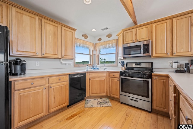 2319 Carova Rd Lot # 22, Corolla, NC 27927 - kitchen with black appliances, light wood-type flooring, light countertops, light brown cabinetry, and recessed lighting