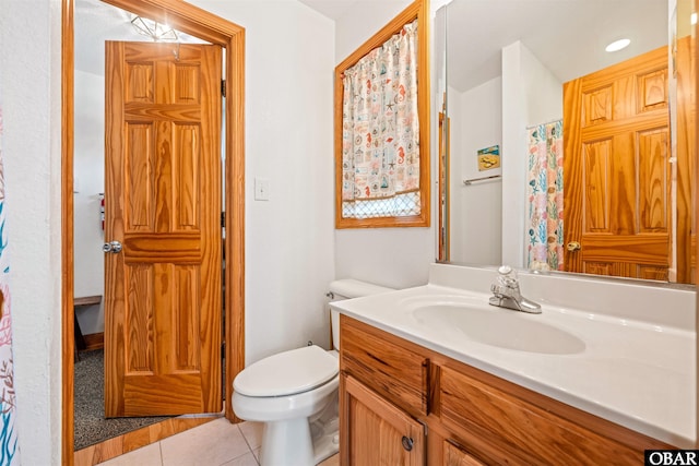 2319 Carova Rd Lot # 22, Corolla, NC 27927 - bathroom featuring toilet, tile patterned flooring, and vanity