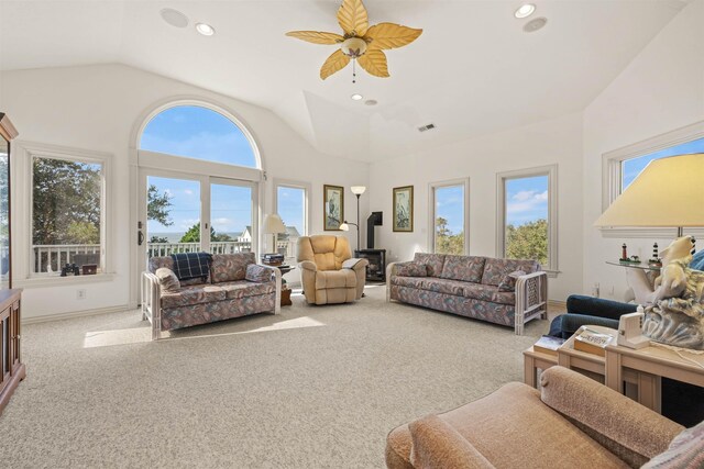 living room with visible vents, baseboards, ceiling fan, carpet floors, and recessed lighting