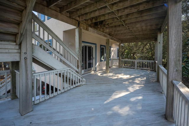 wooden deck featuring stairs