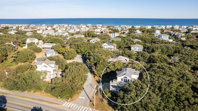 birds eye view of property featuring a residential view and a water view