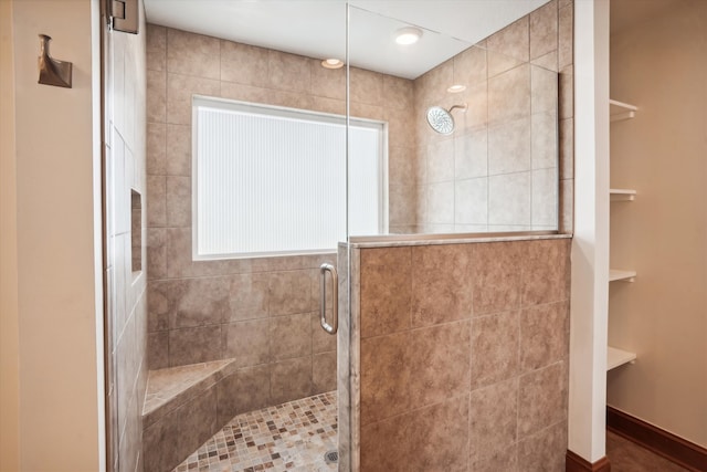 full bathroom with a shower stall