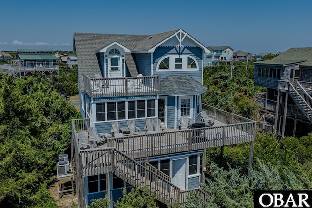 26509 Colony Dr Lot 6, Salvo, NC 27972 - rear view of house with stairs, roof with shingles, a deck, and a balcony