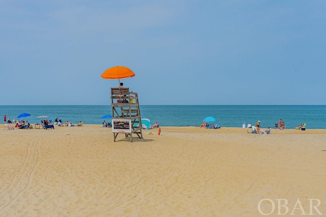 property view of water featuring a view of the beach