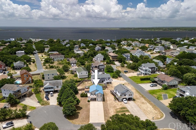 aerial view featuring a water view and a residential view