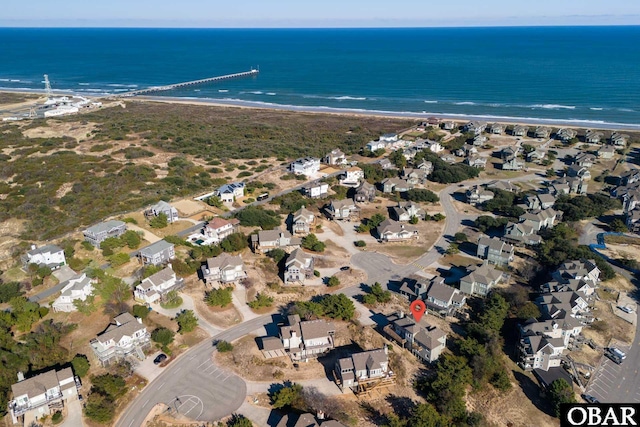 birds eye view of property featuring a residential view and a water view