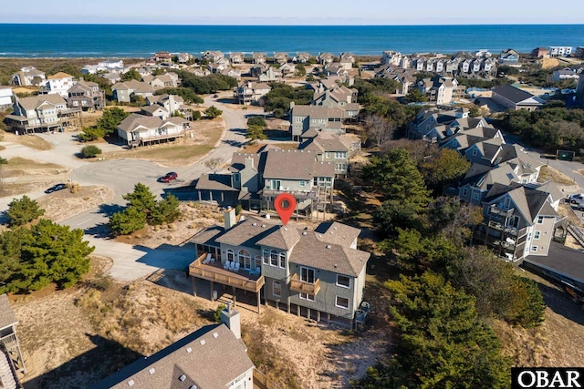 aerial view featuring a residential view and a water view