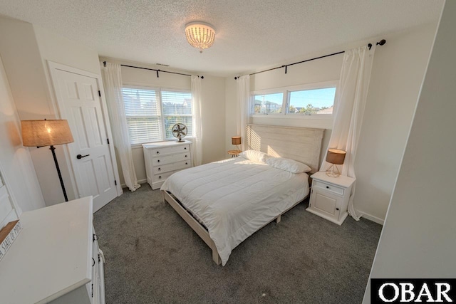 26791 Colony Dr Lot 38, Salvo, NC 27972 - carpeted bedroom featuring a textured ceiling and baseboards