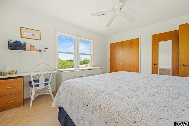 2201 Sandpiper Rd Lot # 13, Corolla, NC 27927 - bedroom with light colored carpet and ceiling fan