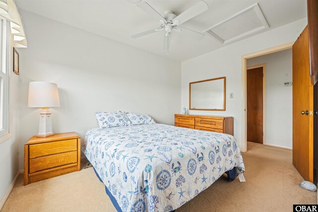 2201 Sandpiper Rd Lot # 13, Corolla, NC 27927 - carpeted bedroom with attic access and a ceiling fan