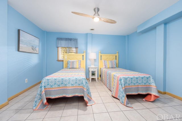 bedroom with light tile patterned floors, ceiling fan, visible vents, and baseboards