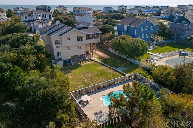 birds eye view of property with a residential view