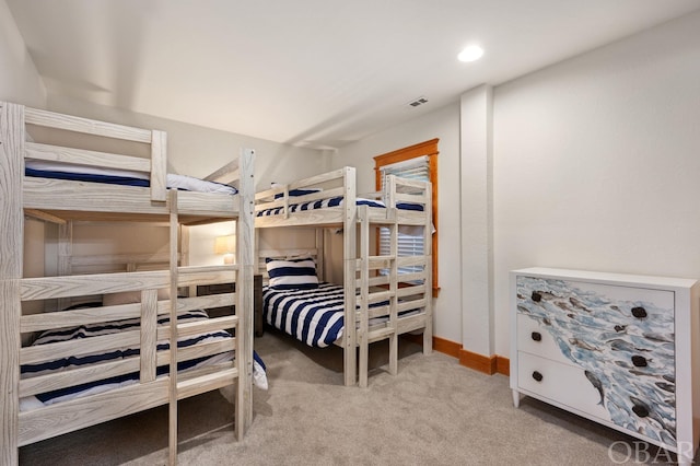 bedroom featuring carpet floors, recessed lighting, visible vents, and baseboards