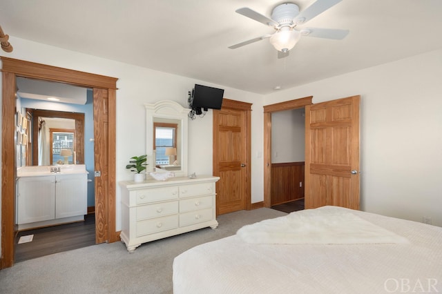 bedroom featuring light carpet and ceiling fan