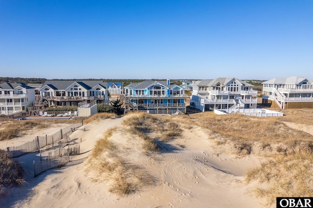 birds eye view of property with a residential view