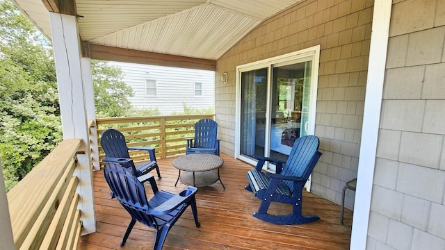 wooden terrace featuring a porch