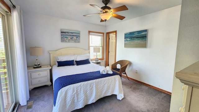 bedroom featuring carpet flooring, ceiling fan, visible vents, and baseboards