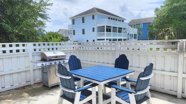 view of patio / terrace with outdoor dining area and grilling area