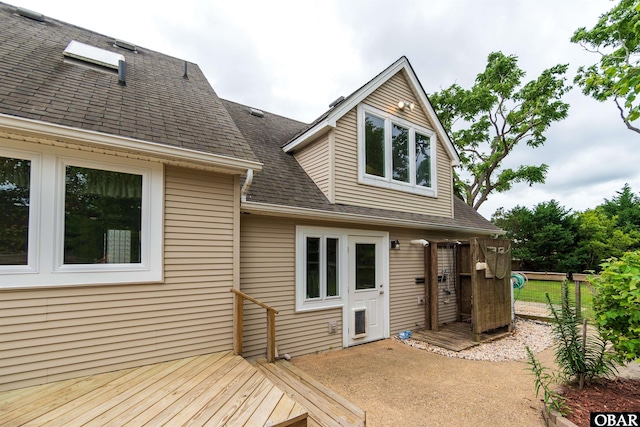 1115 Waterlily Rd, Coinjock, NC 27923 - back of house with roof with shingles and a deck
