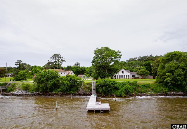 1115 Waterlily Rd, Coinjock, NC 27923 - dock area featuring a water view and stairs