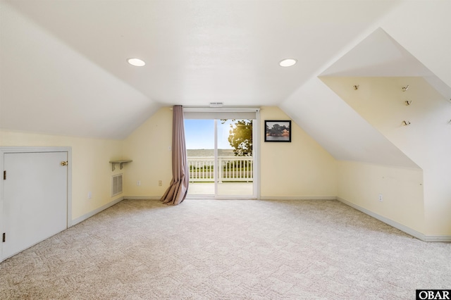1115 Waterlily Rd, Coinjock, NC 27923 - additional living space featuring lofted ceiling, carpet floors, and recessed lighting