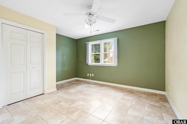 1115 Waterlily Rd, Coinjock, NC 27923 - unfurnished bedroom featuring a closet and a ceiling fan
