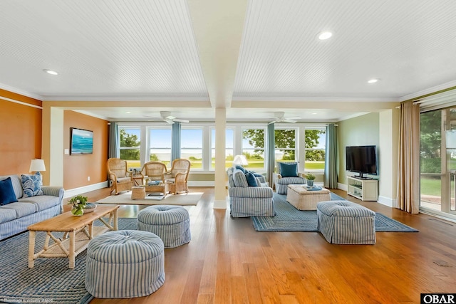1115 Waterlily Rd, Coinjock, NC 27923 - living room featuring crown molding, recessed lighting, plenty of natural light, wood finished floors, and ceiling fan