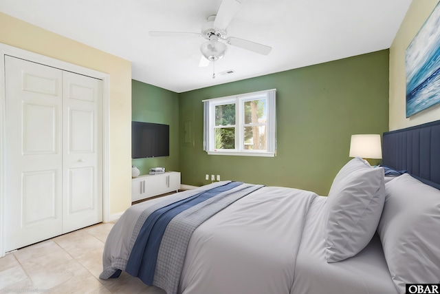 1115 Waterlily Rd, Coinjock, NC 27923 - tiled bedroom featuring a closet and a ceiling fan