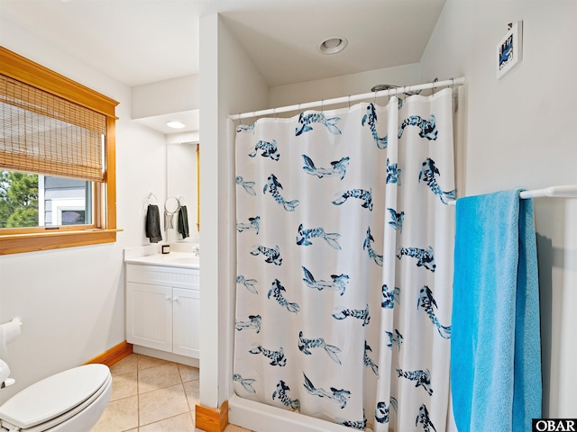 full bathroom featuring tile patterned floors, a shower with shower curtain, toilet, and vanity