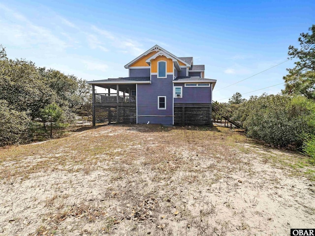 back of property with stairway