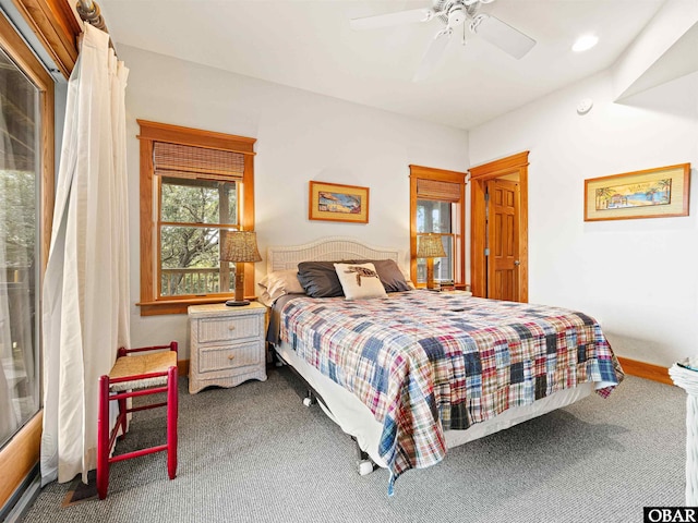 carpeted bedroom with ceiling fan