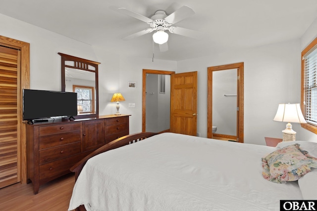 bedroom with ceiling fan and light wood-style floors